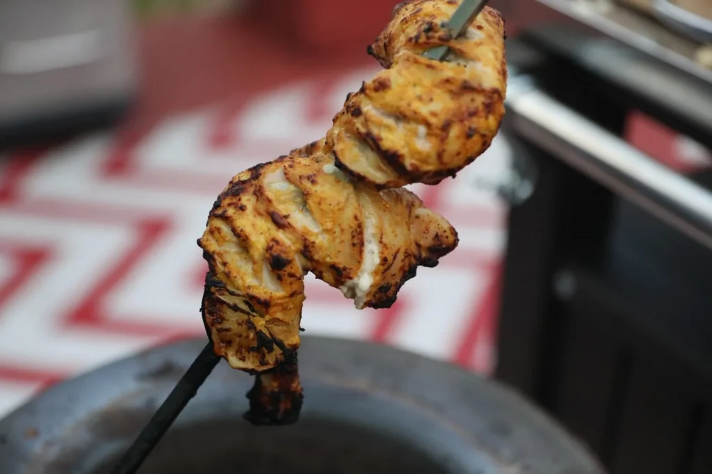 Indian street food catering Melbourne tandoor skewers Jeeta Catering tandoori skewer station at corporate event
